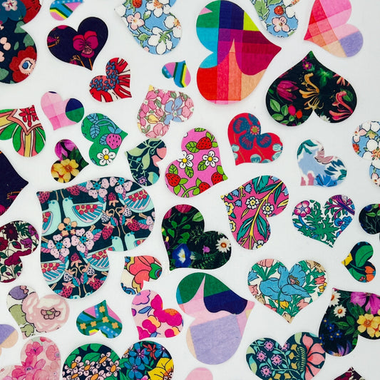 Iron on Hearts in various colorful Liberty of London fabrics, Perfect for upcycling patchwork quilting, baby onesie and bib decorating!